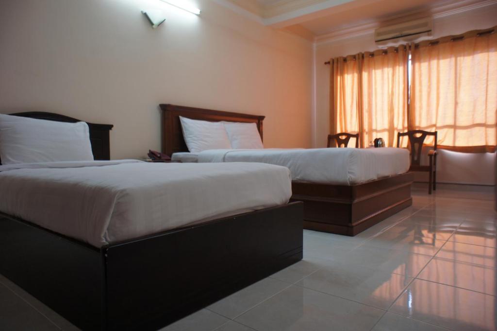 Elegant Inn Saigon Cidade de Ho Chi Minh Quarto foto